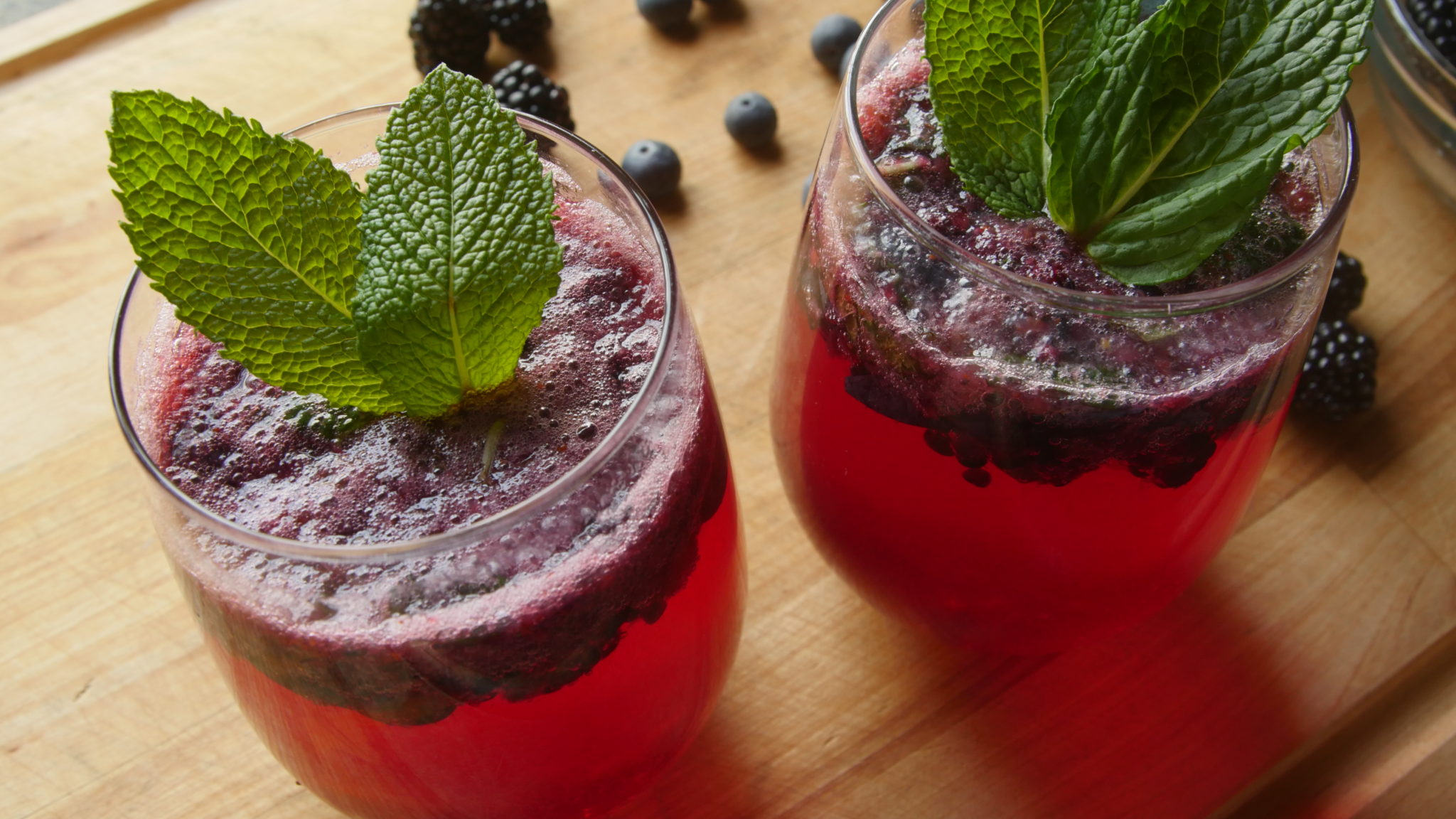 mixed berry white wine spritzer herb cocktail